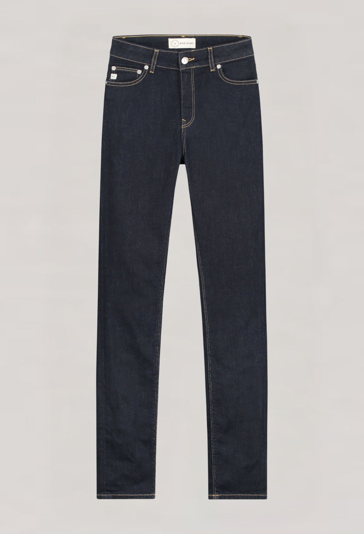 Dark indigo slim-fit jeans with exposed button closure, featuring classic five-pocket design and contrast stitching.