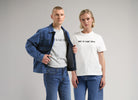 Models wearing sustainable denim outfits, highlighting a blue denim jacket and jeans with eco-friendly t-shirts.