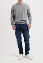 Sustainable MUD Jeans in slate blue, crafted from ethical materials, showcasing classic fit and comfortable style.