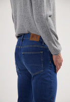 Sustainable MUD Jeans denim jacket made from ethical organic cotton, featuring classic blue wash and buttoned front.