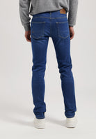 Sustainable MUD Jeans denim jacket and jeans in medium blue wash, showcasing ethical fashion in classic fit.