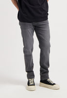 Sustainable MUD Jeans in light blue denim, crafted from organic cotton, showcasing a classic fit with ethical style.