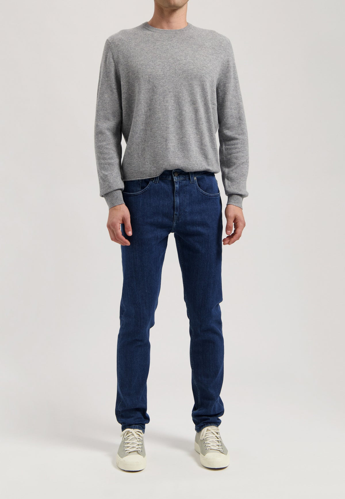 Sustainable MUD Jeans in dark blue denim, crafted ethically from organic cotton, featuring classic design and fit.