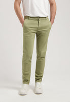Sustainable MUD Jeans in dark denim, highlighting back pocket detail and ethical craftsmanship.